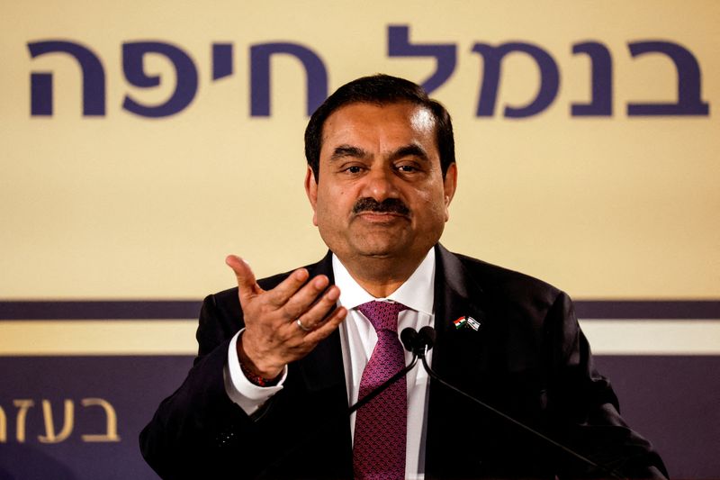 © Reuters. FILE PHOTO: Indian billionaire Gautam Adani speaks during an inauguration ceremony in Haifa port, Israel January 31, 2023. REUTERS/Amir Cohen/File Photo