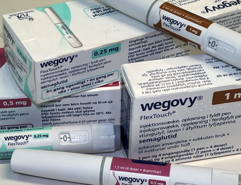 © Reuters. Injection pens and boxes of Novo Nordisk's weight-loss drug Wegovy are shown in this photo illustration in Oslo, Norway, November 21, 2023. REUTERS/Victoria Klesty/Illustration/File Photo