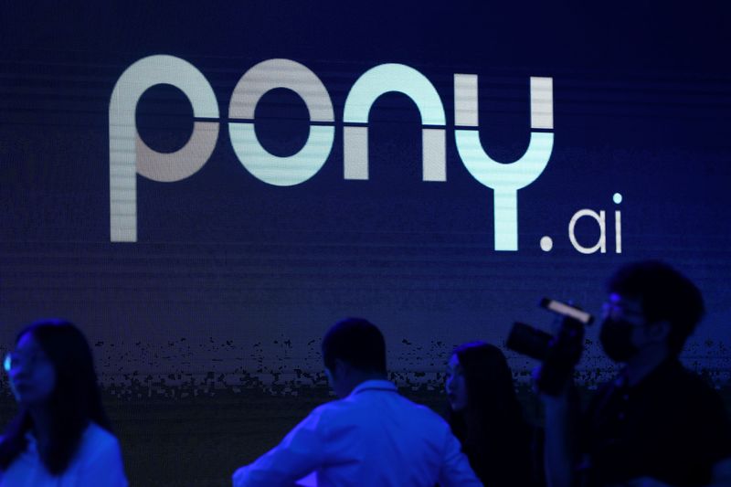 © Reuters. FILE PHOTO: A logo of the autonomous driving technology startup Pony.ai is seen on a screen during an event in Beijing, China May 13, 2021. REUTERS/Tingshu Wang/ File Photo