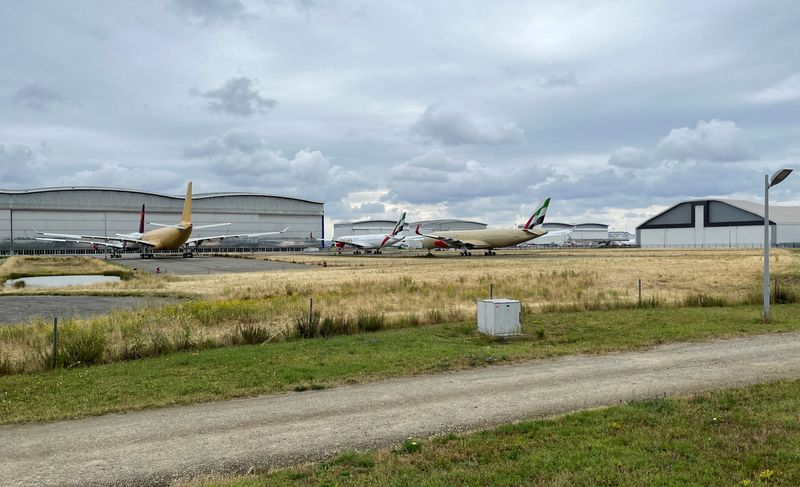 © Reuters. FILE PHOTO : Undelivered Airbus wide-bodied jets are seen parked without engines outside the former A380 factory, near Toulouse, as Airbus faces continued supply chain difficulties, France, June 22, 2024, REUTERS/Tim Hepher/File Photo