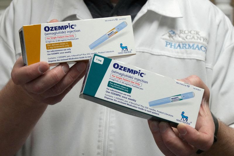 © Reuters. FILE PHOTO: A pharmacist displays boxes of Ozempic, a semaglutide injection drug used for treating type 2 diabetes made by Novo Nordisk, at Rock Canyon Pharmacy in Provo, Utah, U.S. March 29, 2023. REUTERS/George Frey/File Photo