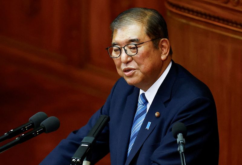 © Reuters. Japan's Prime Minister Shigeru Ishiba delivers his policy speech at the lower house of the parliament in Tokyo, Japan, November 29, 2024.  REUTERS/Issei Kato