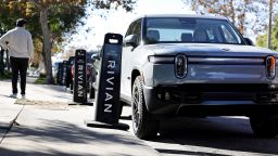 Rivian electric vehicles are parked at the Rivian Venice Hub on November 13, in Venice, California.