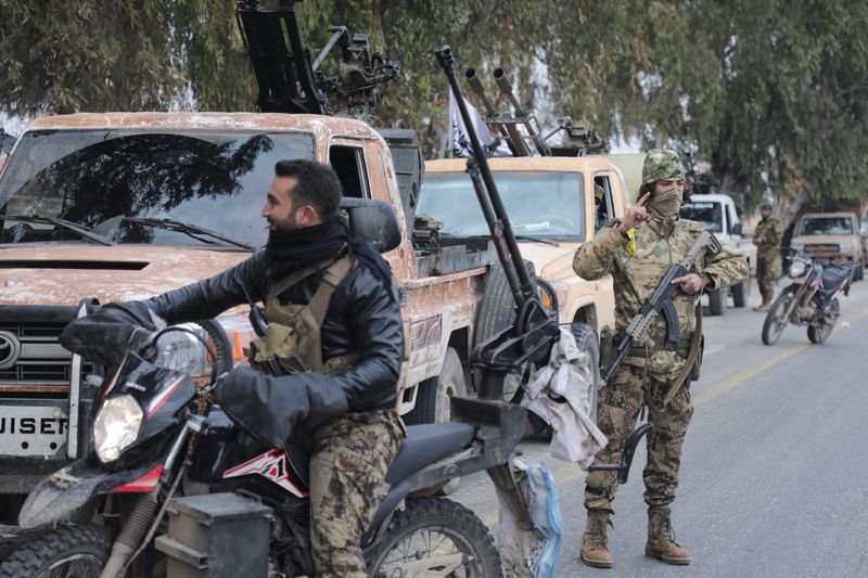 © Reuters. Rebel fighters, Homs countryside, Syria, December 7, 2024. REUTERS/Mahmoud Hasano