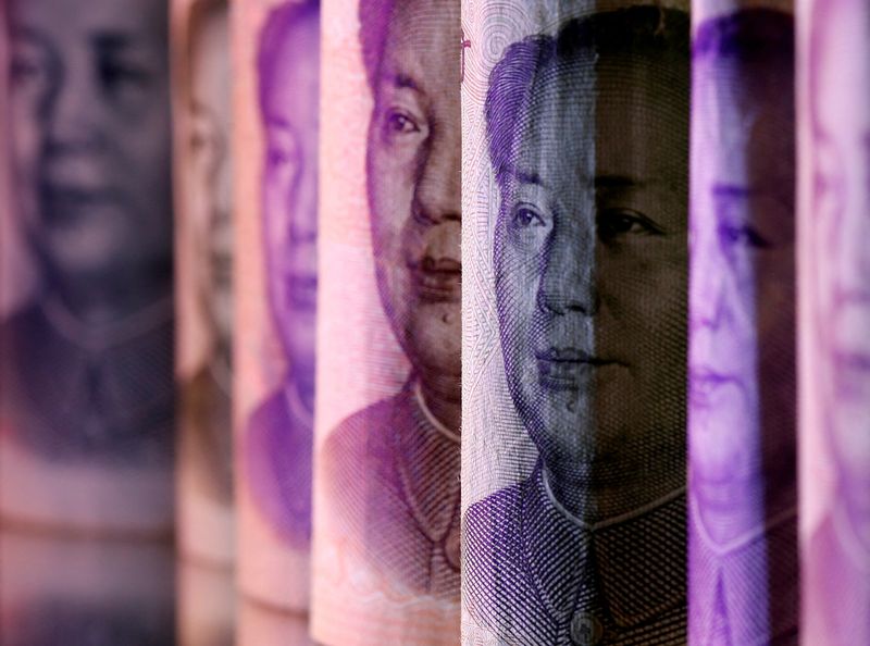 © Reuters. FILE PHOTO: Chinese Yuan banknotes are seen in this illustration taken February 10, 2020. REUTERS/Dado Ruvic/Illustration/File Photo