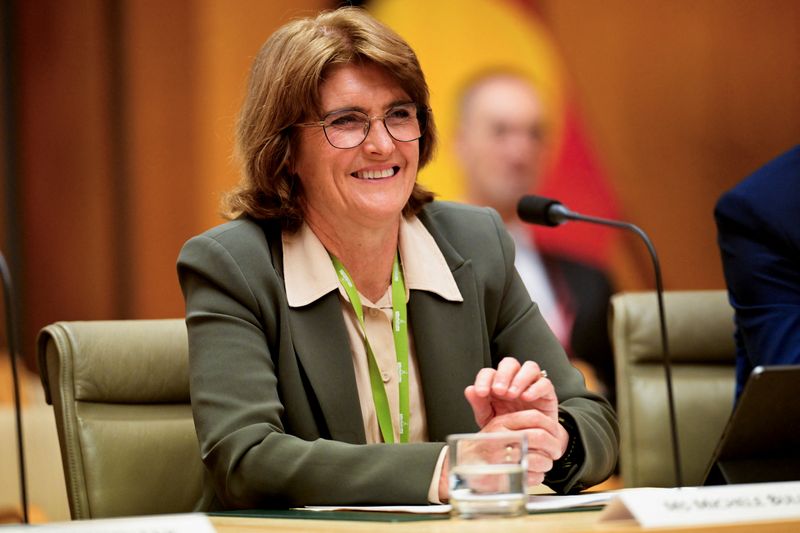 © Reuters. FILE PHOTO: Reserve Bank of Australia's governor Michele Bullock reacts as she faces the House of Representatives Standing Committee on Economics at Australian Parliament House, Canberra, Australia, August 16, 2024. REUTERS/Tracey Nearmy/File Photo