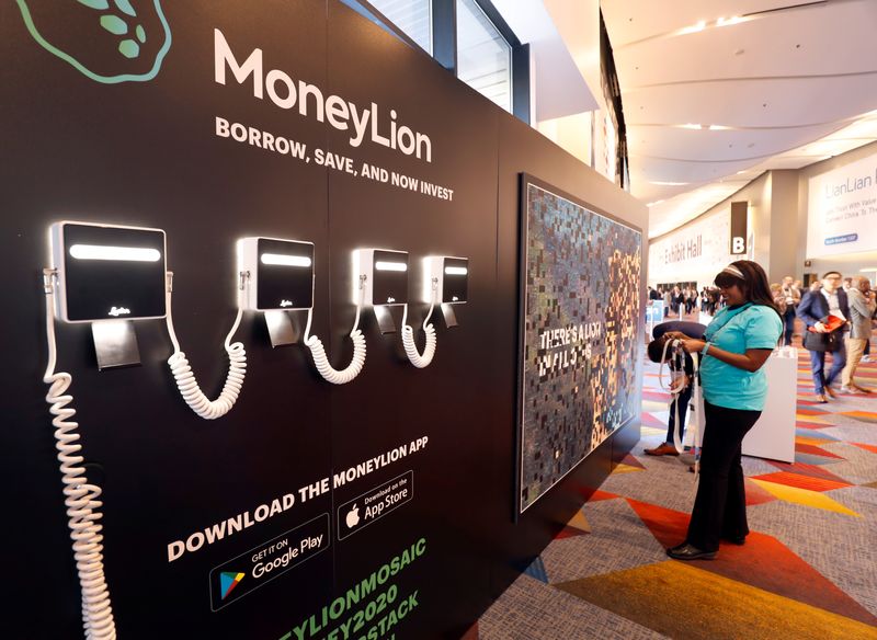 © Reuters. FILE PHOTO: MoneyLion, a digital consumer finance platform, displays in the lobby of the exhibit hall during the Money 20/20 conference in Las Vegas, Nevada, U.S. on October 24, 2017. REUTERS/Steve Marcus/File Photo