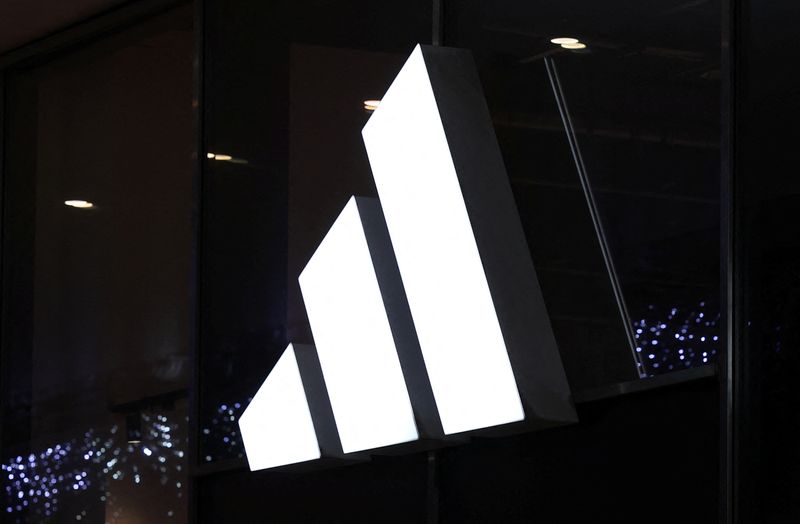 © Reuters. FILE PHOTO: Logo of Adidas brand is displayed on the store in the center of Warsaw, Poland, January 4, 2024. REUTERS/Kacper Pempel/File Photo