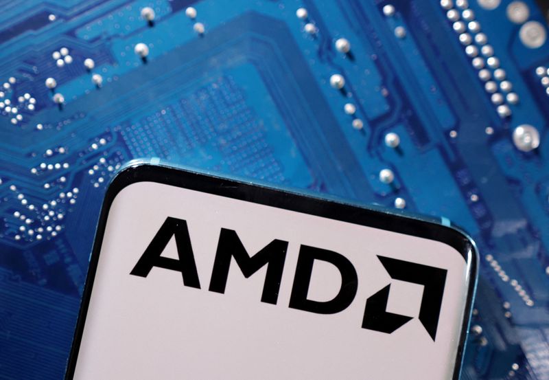 © Reuters. FILE PHOTO: A smartphone with a displayed AMD logo is placed on a computer motherboard in this illustration taken March 6, 2023. REUTERS/Dado Ruvic/Illustration/File Photo