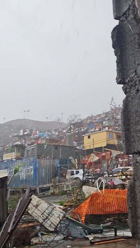 © Reuters. A view shows damage caused by the Cyclone Chido, in Kaweni, Mayotte, France in this screengrab from a social media video, obtained by Reuters on December 14, 2024. @foulani2.00 via TikTok via REUTERS