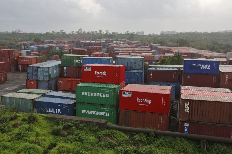 © Reuters. FILE PHOTO: Cargo containers are seen stacked outside the container terminal of Jawaharlal Nehru Port Trust (JNPT) in Mumbai, India, July 15, 2015.  REUTERS/Shailesh Andrade/File Photo