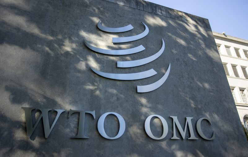 © Reuters. FILE PHOTO: A logo is seen at the World Trade Organization (WTO) headquarters before a news conference in Geneva, Switzerland, October 5, 2022. REUTERS/Denis Balibouse/File Photo