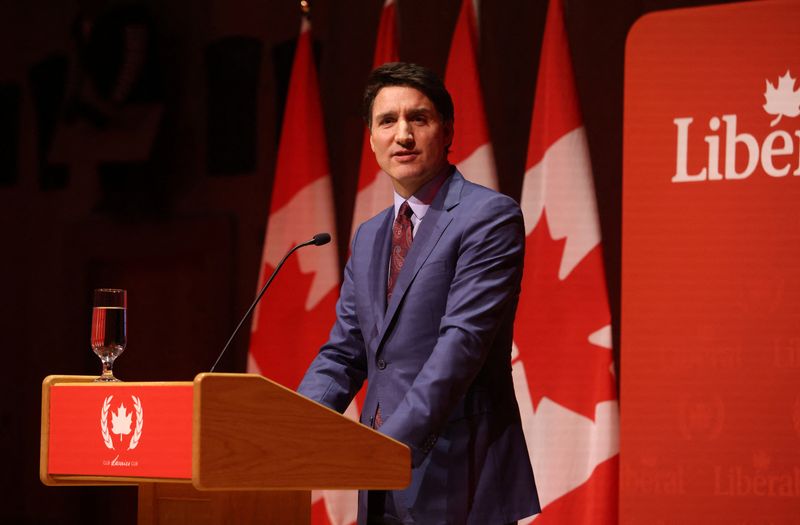 © Reuters. Canada's Prime Minister Justin Trudeau speaks at the Laurier Club holiday party in Gatineau, Quebec, Canada, December 16, 2024.  REUTERS/Patrick Doyle/File photo