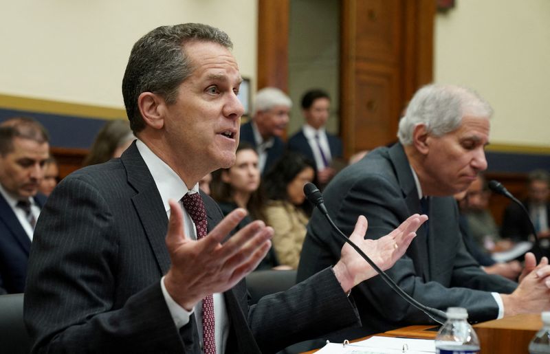 © Reuters. FILE PHOTO: Federal Reserve Board Vice Chair for Supervision Michael Barr and Federal Deposit Insurance Corporation Chairman Martin Gruenberg testify at a House Financial Services Committee hearing on the response to the recent bank failures of Silicon Valley Bank and Signature Bank, on Capitol Hill in Washington, U.S., March 29, 2023.  REUTERS/Kevin Lamarque/File Photo