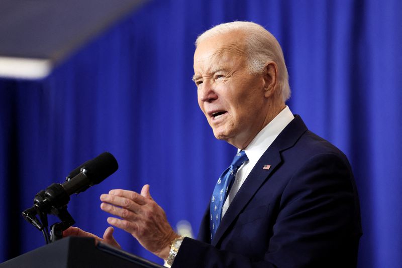 © Reuters. FILE PHOTO: U.S. President Joe Biden speaks as he visits the Department of Labor for an event honoring the nation's labor history and Frances Perkins, longest serving U.S Secretary of Labor, in Washington, U.S., December 16, 2024. REUTERS/Kevin Lamarque/File Photo