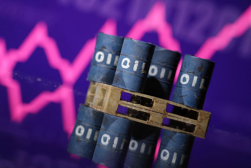 © Reuters. Miniatures of oil barrels and a rising stock graph are seen in this illustration taken January 15, 2024. REUTERS/Dado Ruvic/Illustration