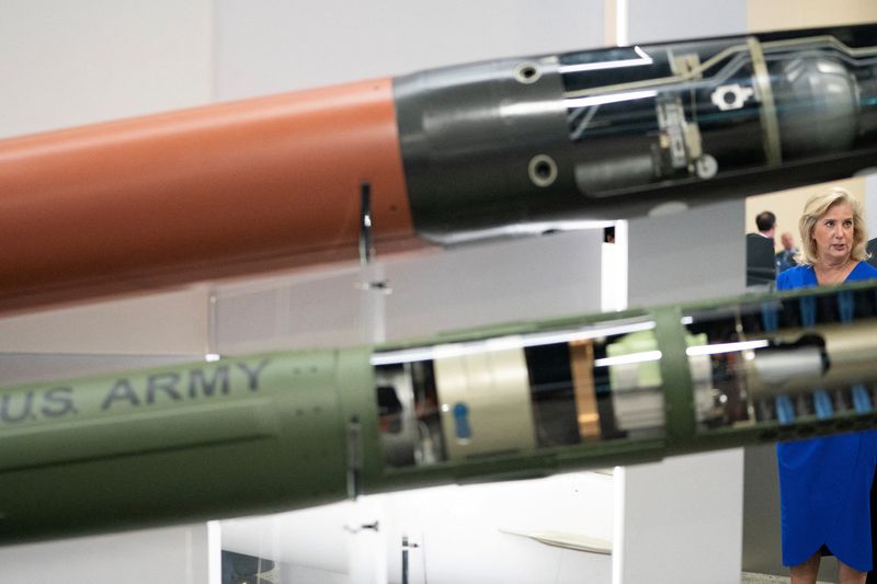 © Reuters. FILE PHOTO: U.S. Secretary of the Army Christine Wormuth speaks near a Terminal High Altitude Area Defense (THAAD) missile and the Pac-3 Missile Segment Enhancement during the Association of the United States Army annual meeting and exposition at the Walter E. Washington Convention Center in Washington, U.S., October 14, 2024. REUTERS/Nathan Howard/File Photo