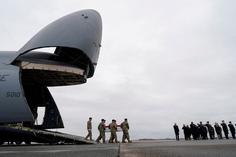 © Reuters. FILE PHOTO: U.S. President Joe Biden, first lady Jill Biden, Secretary of Defense Lloyd J. Austin III and Chairman of the Joint Chiefs of Staff and Air Force General Charles Q. Brown attend the dignified transfer of the remains of Army Reserve Sergeants William Rivers, Kennedy Sanders and Breonna Moffett, three U.S. service members who were killed in Jordan during a drone attack carried out by Iran-backed militants, at Dover Air Force Base in Dover, Delaware, U.S., February 2, 2024. REUTERS/Joshua Roberts/File Photo