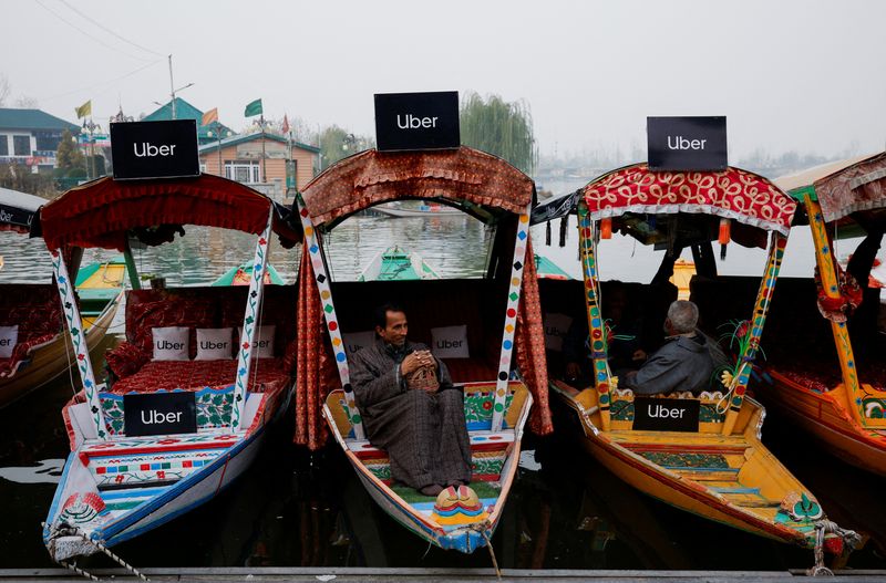 © Reuters. Uber signs are displayed on