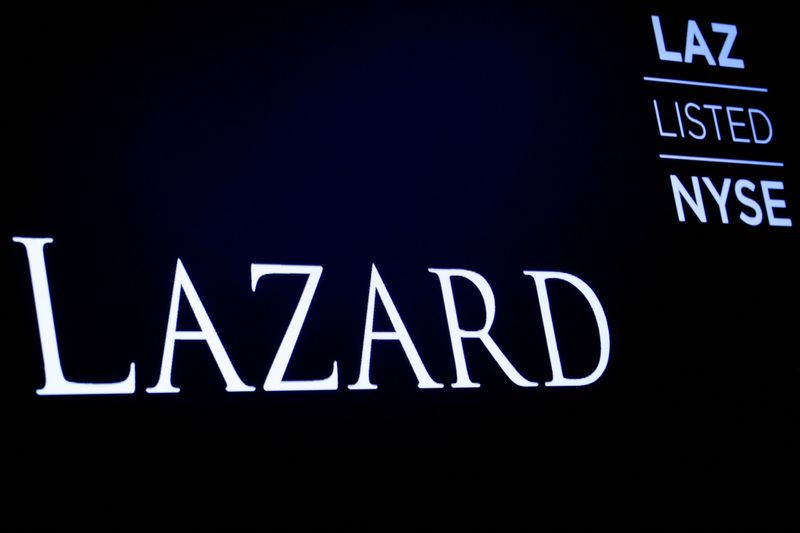 © Reuters. FILE PHOTO: The logo and trading information for Lazard Ltd appear on a screen on the floor at the New York Stock Exchange (NYSE) in New York, U.S., April 24, 2019. REUTERS/Brendan McDermid/File Photo