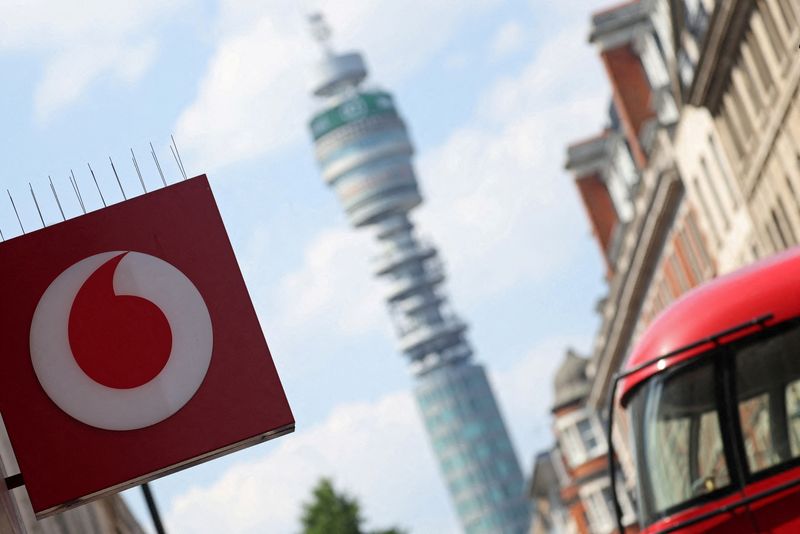 © Reuters. FILE PHOTO: Branding is displayed for Vodafone at one of its stores in London, Britain, June 14, 2023. REUTERS/Toby Melville/File Photo