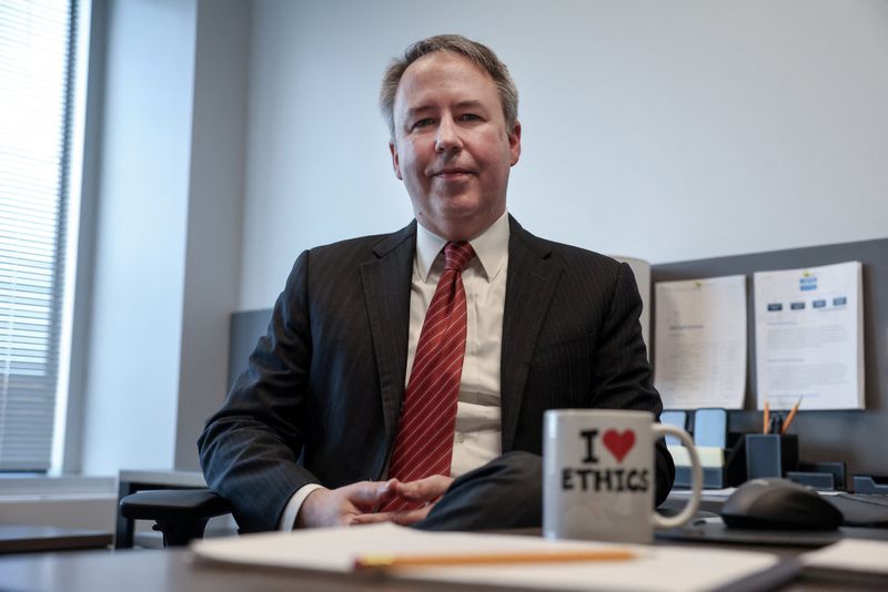 © Reuters. David Huitema, Director of the Office of Government Ethics, sits down with Reuters for his first interview on the job, at his office in Washington, U.S., January 2, 2025. REUTERS/Evelyn Hockstein