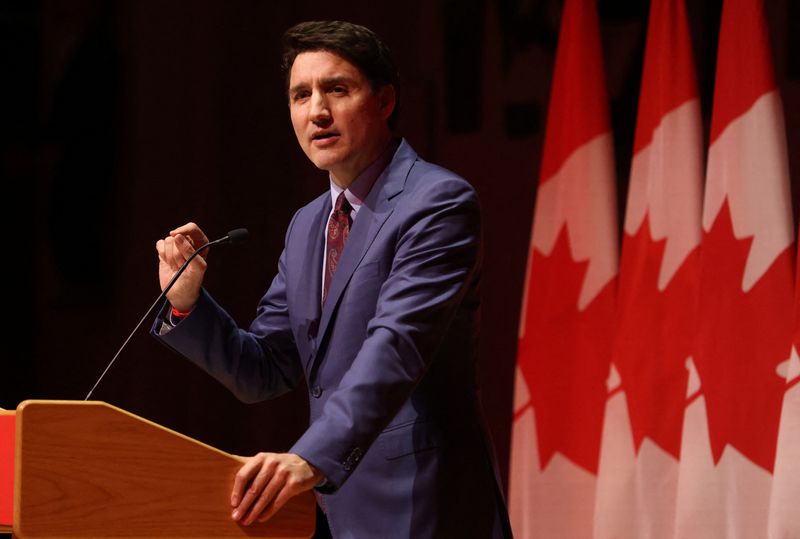 © Reuters. FILE PHOTO: Canada's Prime Minister Justin Trudeau speaks at the Laurier Club holiday party in Gatineau, Quebec, Canada, December 16, 2024.  REUTERS/Patrick Doyle/File Photo