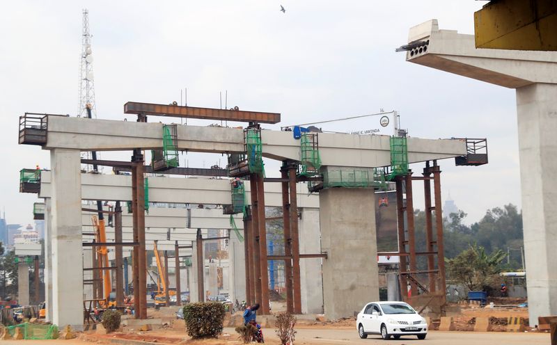 © Reuters. FILE PHOTO: A motorist drives on the controlled section during the construction of the Nairobi Expressway, undertaken by the China Road and Bridge Corporation (CRBC) on a public-private partnership (PPP) basis, along Uhuru highway in Nairobi, Kenya August 5, 2021. REUTERS/Thomas Mukoya/File photo