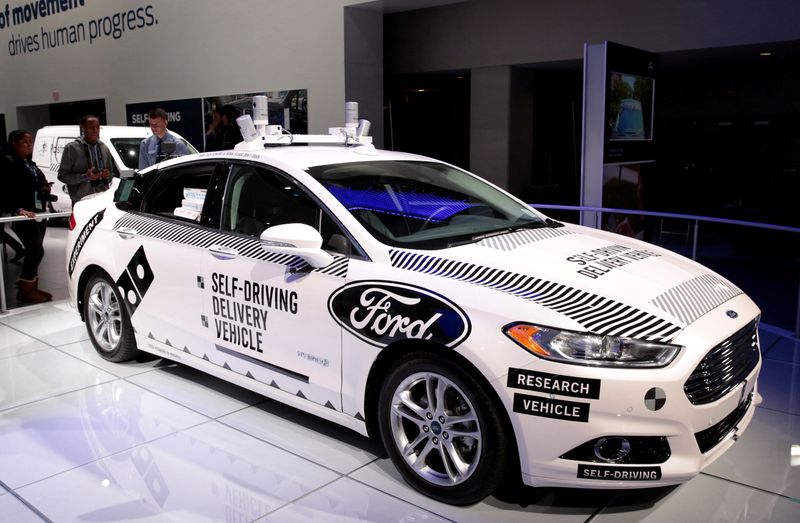 © Reuters. FILE PHOTO: A Ford Fusion hybrid, Level 4 autonomous vehicle, used by Ford Motor and Domino's Pizza to test a self-driving pizza delivery car in Michigan, is displayed during Press Days of the North American International Auto Show at Cobo Center in Detroit, Michigan, U.S., January 16, 2018. REUTERS/Rebecca Cook/File Photo