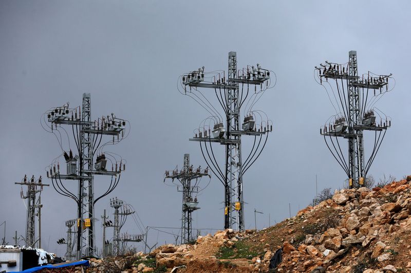 © Reuters. FILE PHOTO: An Israeli power distribution plant is seen in Hebron in the Israeli-occupied West Bank January 22, 2020. REUTERS/Mussa Qawasma/File Photo