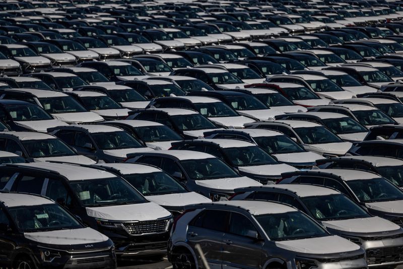 © Reuters. FILE PHOTO: New vehicles are seen at a parking lot in the Port of Richmond, at the bay of San Francisco, California June 8, 2023. REUTERS/Carlos Barria/File Photo