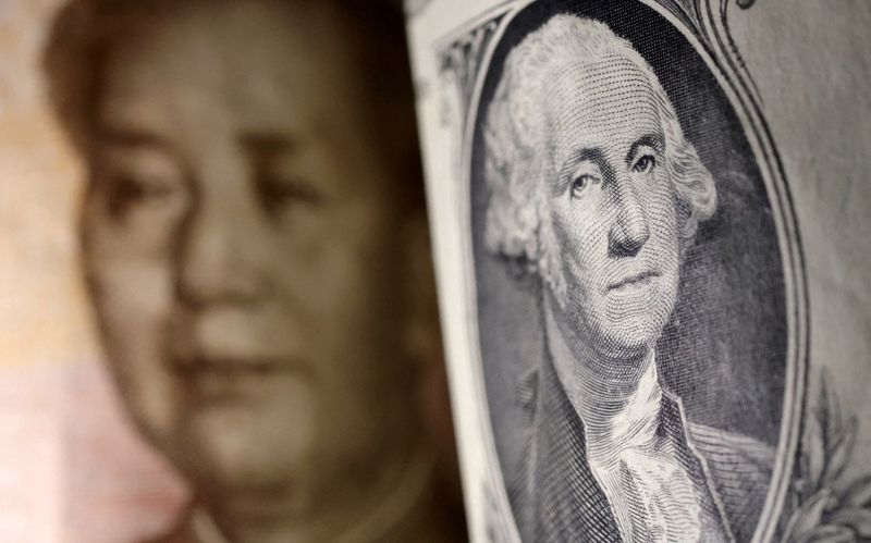 © Reuters. FILE PHOTO: U.S. Dollar and Chinese Yuan banknotes are seen in this illustration taken January 30, 2023. REUTERS/Dado Ruvic/Illustration/File Photo