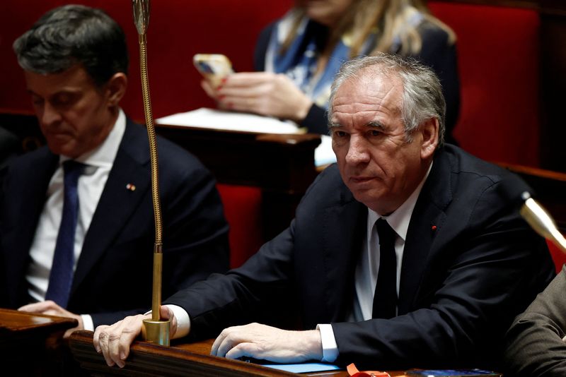 © Reuters. French Prime Minister Francois Bayrou and Minister for Overseas Territories Manuel Valls attend a debate on a motion of no-confidence against the French government, tabled by members of parliament of La France Insoumise (France Unbowed - LFI) parliamentary group and joined by the Communists and the Greens (Les Ecologistes - EELV), at the National Assembly in Paris, France, January 16, 2025. REUTERS/Benoit Tessier