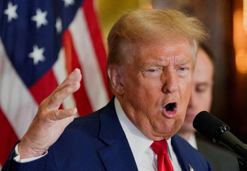 © Reuters. FILE PHOTO: Republican presidential nominee and former U.S. President Donald Trump gestures as he speaks during a press conference at Trump Tower in New York City, U.S., September 6, 2024. REUTERS/David Dee Delgado/File Photo