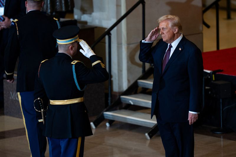 © Reuters. FILE PHOTO: President Donald Trump reviews the troops in Emancipation Hall during inauguration ceremonies at the U.S. Capitol in Washington, on Jan. 20, 2025.  Angelina Katsanis/Pool via REUTERS/File Photo