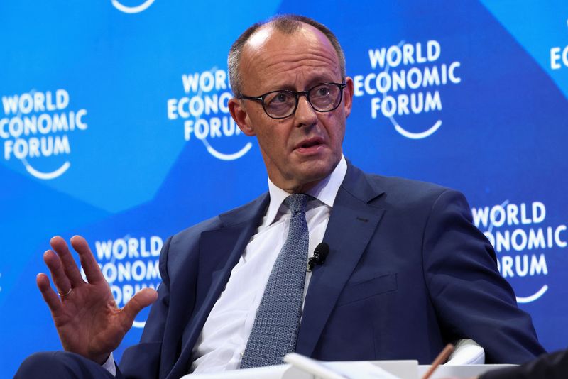 © Reuters. German conservative candidate for chancellor and Christian Democratic Union (CDU) leader Friedrich Merz reacts during the 55th annual World Economic Forum (WEF) meeting in Davos, Switzerland, January 21, 2025. REUTERS/Yves Herman