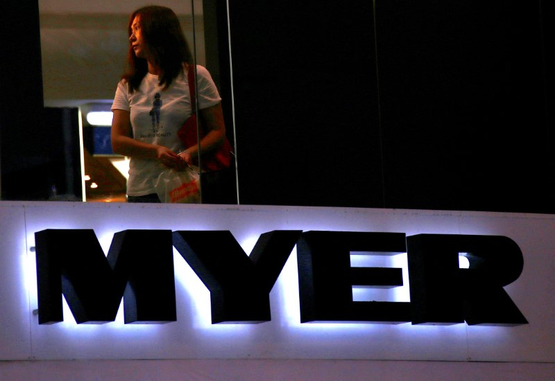 © Reuters. FILE PHOTO: A customer is seen inside a retail store for Australia's Myer Holdings Ltd's in central Sydney, Australia, February 19, 2018.   REUTERS/David Gray/File Photo