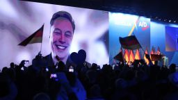 Tech billionaire Elon Musk speaks live via a video transmission during a speech by Alice Weidel, chancellor candidate of the far-right Alternative for Germany (AfD) political party, at the AfD election campaign launch rally on January 25, 2025 in Halle, Germany.